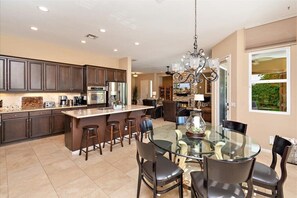 Large Gourmet Kitchen. Bar seating for 4 and Dining table for 6