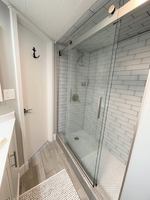 Tile shower with sliding  glass door