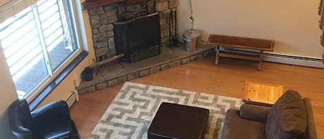 Living area with wood fireplace, cable TV and BluRay player