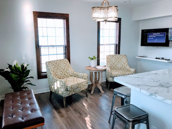 A sitting area and TV in the kitchen.