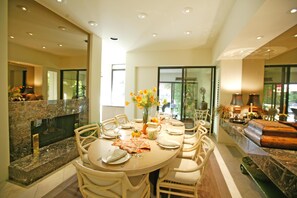 Formal dining room table expands to seat 8
