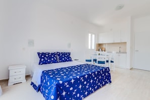 Comfortable queen size bed is made for two people.