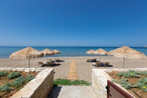 The beach that is right in front of the villa.