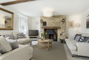 Ground floor:  Comfortable seating in the light and airy sitting room