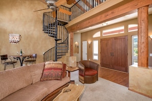 Entryway with spiral staircase  to the loft 
