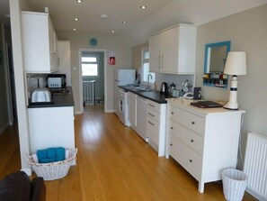 Open plan kitchen with sea views