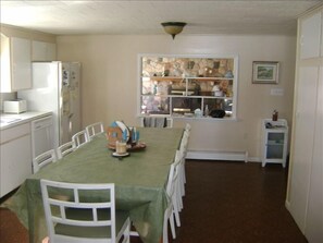 Kitchen looking into family room. 2nd fridge in back room. Gas stove DW - MW