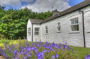 The cottage has it's own pretty garden on two sides