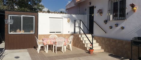 Front of the guest house, and front patio.