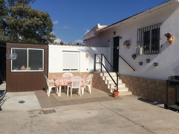 Front of the guest house, and front patio.