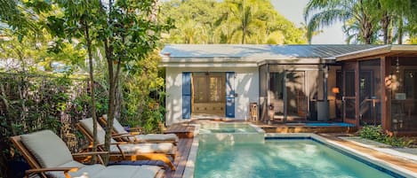 Large private pool and hot tub in the back yard overlooking the garden. 