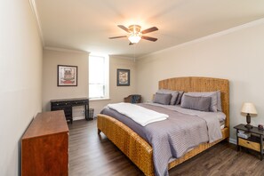Master bedroom with king size bed.