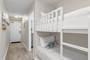 These built-in bunks include dimmable lights and USB charging—perfect for kids, teens, or extra guests.
