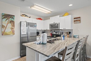 A great spot for casual bites, kid-friendly meals, or staying part of the conversation while you cook.