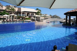  The beach front pool with cabanas... with restaurant in the background.