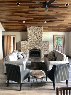 Beautifully designed area to enjoy your company by the gas fireplace.