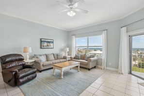 Living Area with Flat Screen TV and Access to Private Covered Balcony (Queen Sleeper Sofa)