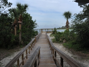 View from Porch leading to dock and beach