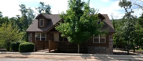 No Steps! Current view of cabin with fresh paint and landscaping completed.