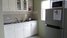 Kitchen: Includes stove, microwave, and refrigerator - perfect for simple meals