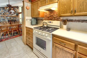 Kitchen view with dining room