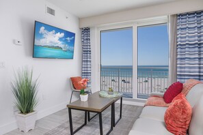 Living Room: Plush seating, cable TV and stunning ocean views