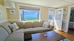 Comfortable living room with beautiful water views