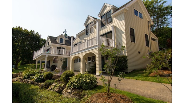 Boathouse unit located under left porch.  Private parking for 2 cars.