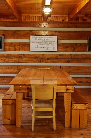 Large, farmhouse style table provides seating for the whole family.  