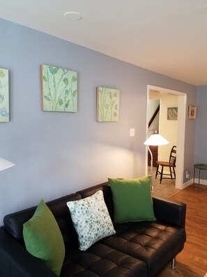Spring triptych above the guest sofa