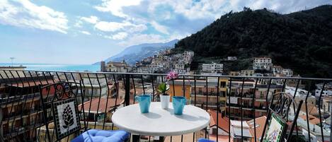 Balcony overlooking the  mountains, the city and the sea