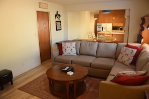 Cozy family room seating with garage access. 