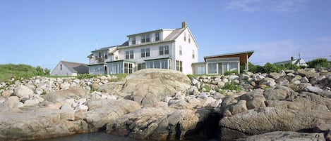 View of house from the water, summer