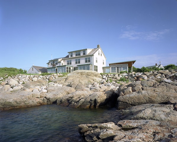 View of house from the water, summer