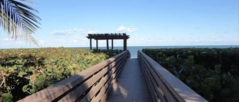 Boardwalk from the backyard leading to the beautiful beach and relaxing gazebo