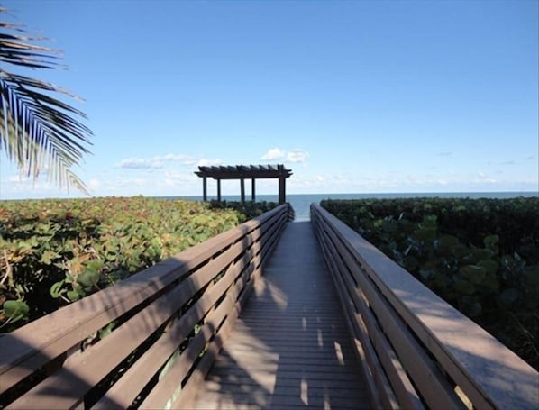 Boardwalk from the backyard leading to the beautiful beach and relaxing gazebo