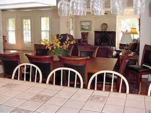 Dining room with new furniture & part of living room with new leather furniture