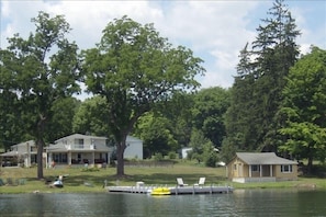 Beautiful Keuka Manor from the lake with the "honeymoon cottage" (priced separat