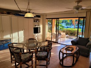 Main living area looking from kitchen to Patio/Marina