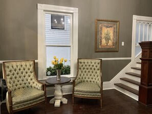 Receiving room with grand staircase.