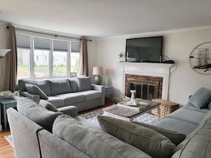 New sectional and couch, plenty of comfortable seating.