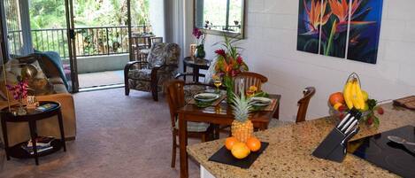 The living area opens out to the lanai and garden