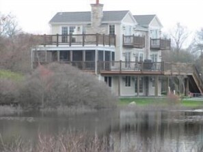 Our own private pond houses lots of wildlife - ducks, geese, and cranes!