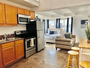 Kitchen area, and second bed