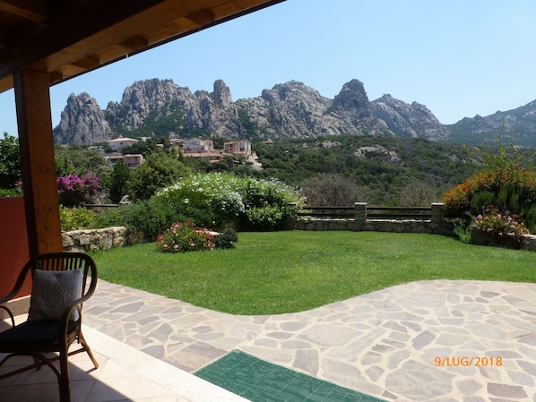 Veranda, garden and view.