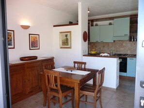 Living room, dining side.