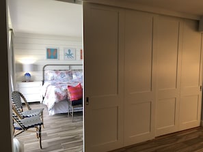 Solid wood sliding doors close completely for privacy.