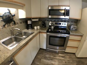 Fully stocked kitchen for preparing meals at the condo.