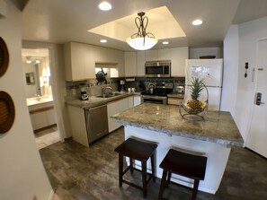 Fully stocked kitchen for preparing meals at the condo.