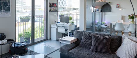 Living room opens onto dining area & covered terrace